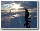 camera ready to photograph a winter scene